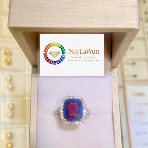 A beautiful ring made of a combination of clear garnet and genuine diamond.