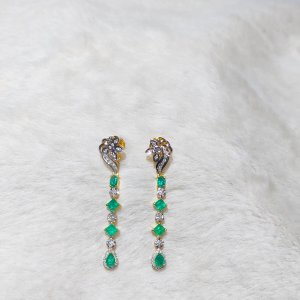 These Colombian emerald and diamond earrings and pendants will make your eyes sparkle.