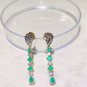 These Colombian emerald and diamond earrings and pendants will make your eyes sparkle.