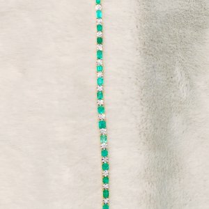 These Colombian emerald and diamond earrings and pendants will make your eyes sparkle.